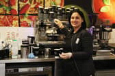 An assistant serves coffee in a Marks & Spencer café. M&S is set to close 11 cafes in smaller food shops to free up space for popular products (Photo: Ker Robertson/Getty Images)