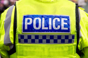 A man has been arrested on suspicion of attempted murder after a police officer was stabbed in the neck.