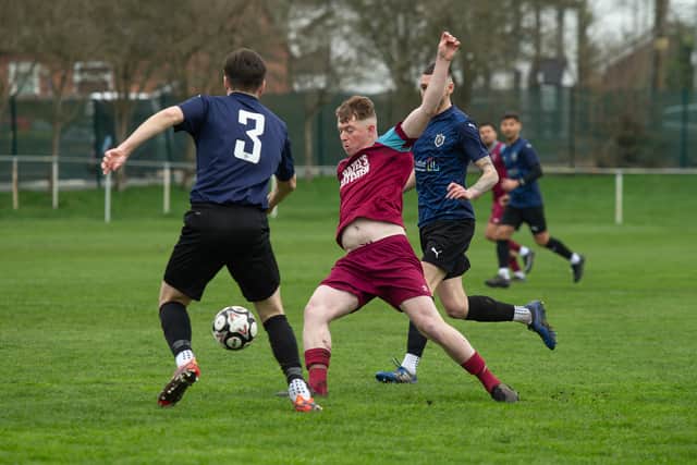 Dawley Town's Brodie McLeod and FC Nations' George Robinson