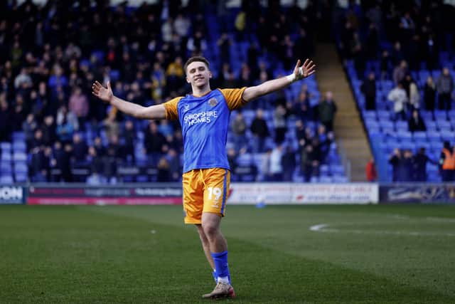 Iwan Morgan celebrates after scoring before half-time