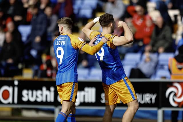 Iwan Morgan celebrates his goal with George Lloyd