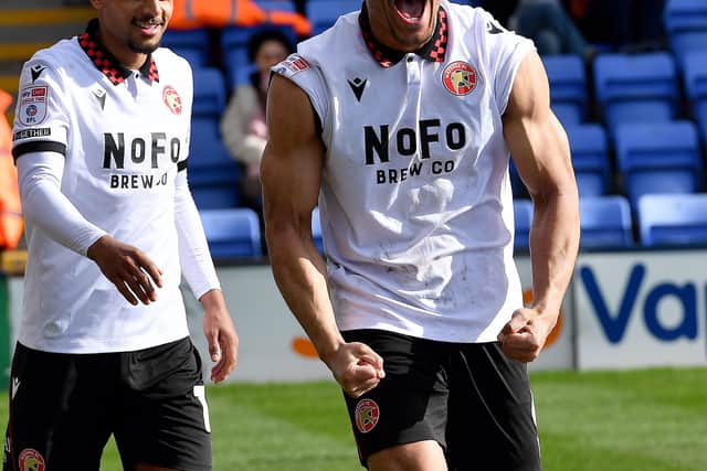 Priestley Farquharson celebrates scoring Walsall's winning goal