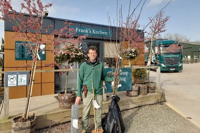 Mr Matthews and some of the donated trees