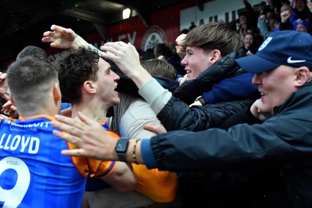 Iwan Morgan and his Shrewsbury Town team-mates celebrate at Accrington Stanley
