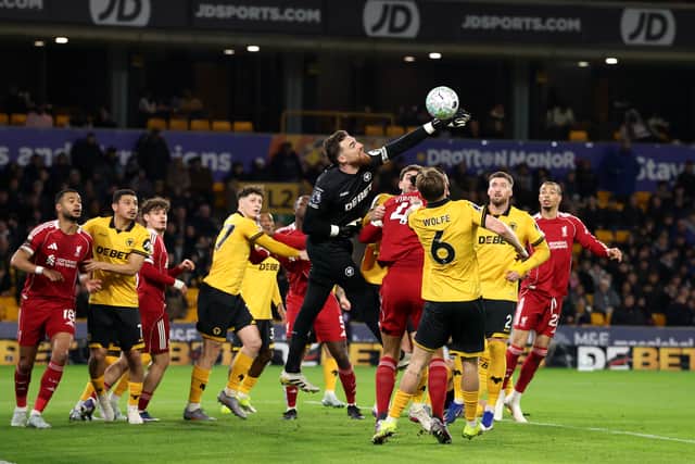 WOLVERHAMPTON, ENGLAND - MARCH 03: Jose Sa of Wolverhampton Wanderers punches the ball clear during the Premier League match between Wolverhampton Wanderers and Liverpool at Molineux on March 03, 2026 in Wolverhampton, England. (Photo by David Rogers/Getty Images)