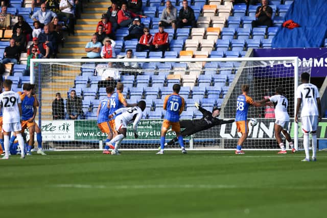 Ben Woodburn scores for Salford City in the reverse fixture
