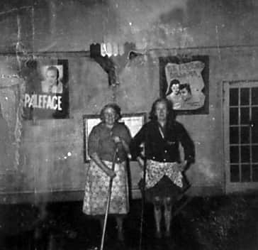 Staff at the Grand cinema, Wellington. Undated, but likely to be c.1948 as the movie Paleface on the poster in the background was a 1948 film. They are obviously cleaners or similar. This picture was shared by Mrs Lynne Purcell, and is another from the collection of her late father Fred Brown.