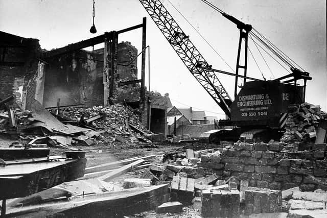 Demolition work under way on the Clifton buildings at Ludlow on April 1, 1987. The story was: 'Ludlow's former cinema held its last picture show some years ago. Now the building is heading for High Noon as a demolition crew gets to work on the steel-framed furniture. The Clifton has been at the centre of a local campaign aimed at saving it for community and arts use. Its fate was sealed when district councillors gave permission for flats to be built on the Old Street site.' 