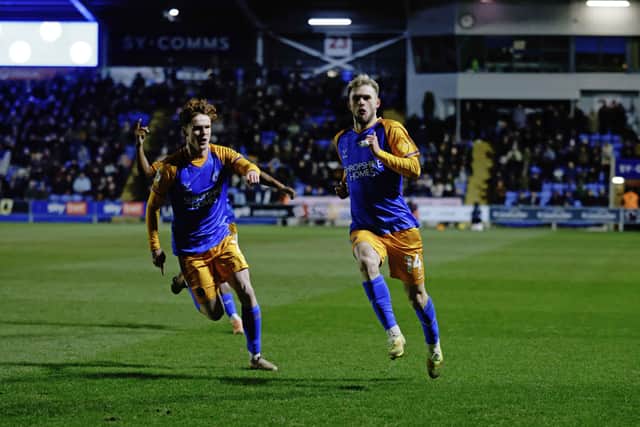 Taylor Perry celebrates after scoring for Shrewsbury Town