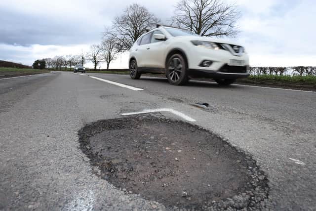 One of the giant craters which had opened up on the A442 Bridgnorth Road.
