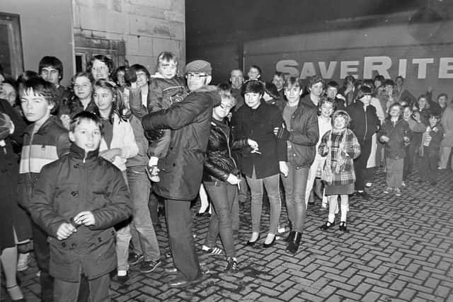 The queue at the Clifton cinema, Wellington, on Friday, December 10, 1982, to watch the opening night of the blockbuster movie ET. 