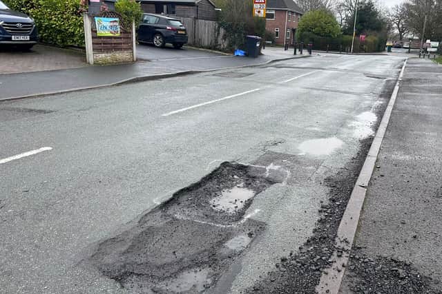 One of the many major potholes on Curriers Lane in Shifnal.