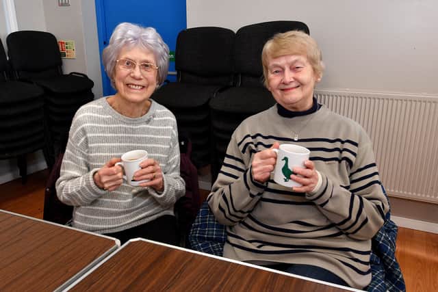 Members Ann Phillips and Chris Brown enjoy a cuppa. Photo: Tim Thursfield