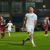 AFC Telford United's Jordan Piggott celebrates his late headed equaliser against South Shields. Pic: Kieren Griffin