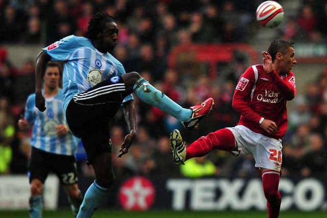Nottingham Forest's Radoslaw Majewski and Peterborough United's Exodus Geohaghon (left). Picture: PA