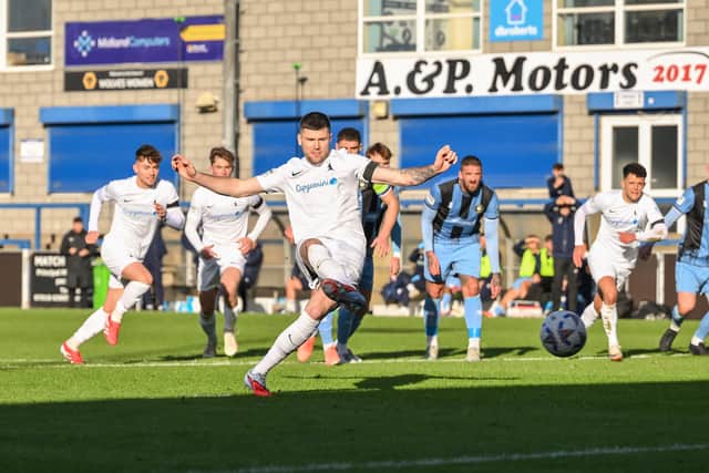 Matty Stenson fires home from the penalty spot for AFC Telford United against Worksop Town. Pic: Kieren Griffin
