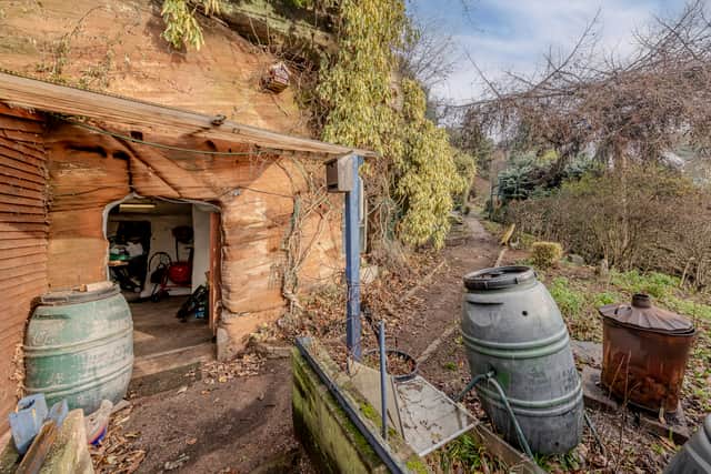 A stunning 16th-century West Midlands cottage built into a carved-out cave has gone on sale
