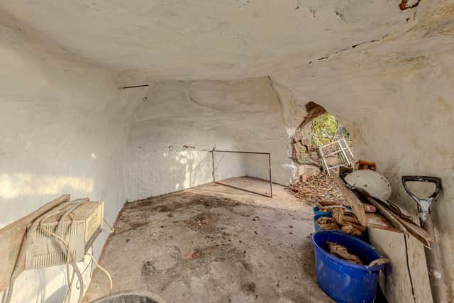 A stunning 16th-century West Midlands cottage built into a carved-out cave has gone on sale