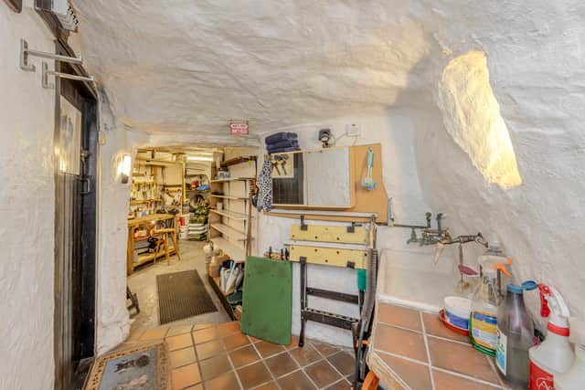 A stunning 16th-century West Midlands cottage built into a carved-out cave has gone on sale