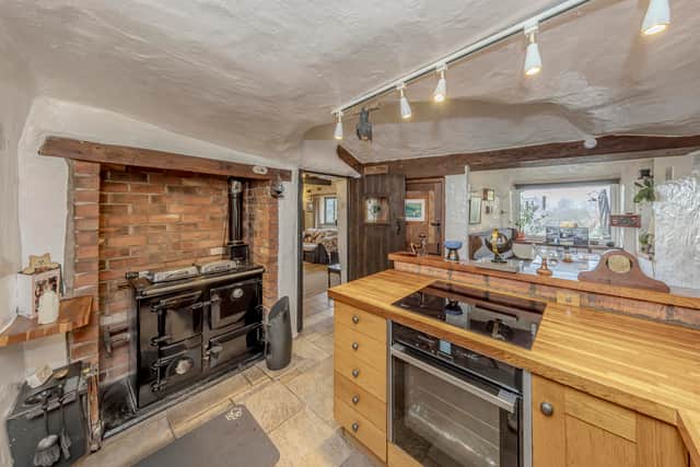 A stunning 16th-century West Midlands cottage built into a carved-out cave has gone on sale