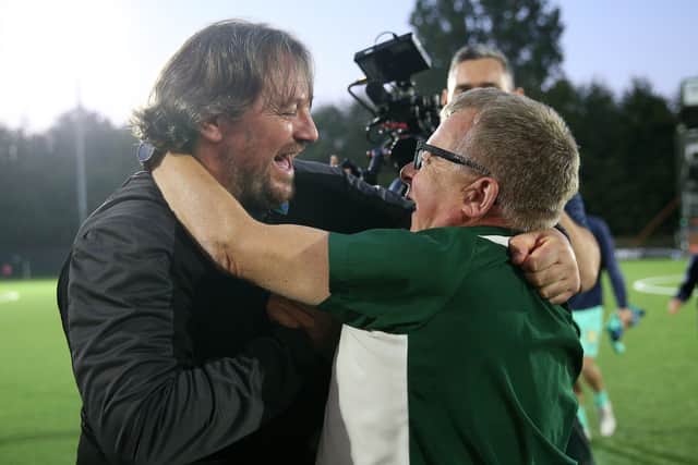 The New Saints manager Craig Harrison and Mike Harris celebrate qualifying for the league phase of the Uefa Conference League