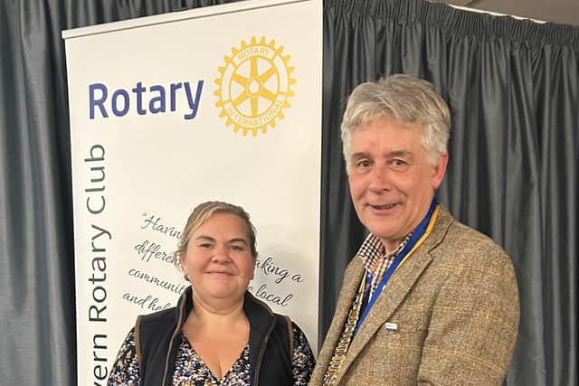 President Johnathan Callwood presents latest Shrewsbury Severn Rotary Club member Gemma Wasteney with her lapel badge.