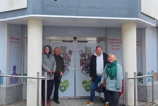 Councillors Emma Holding, Jim McGinn, Paul Davis and Joan Gorse in front of the former Halifax building which has been bought by Wellington Town Council
