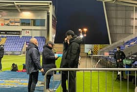 Michael Appleton speaking to Isaac Lee