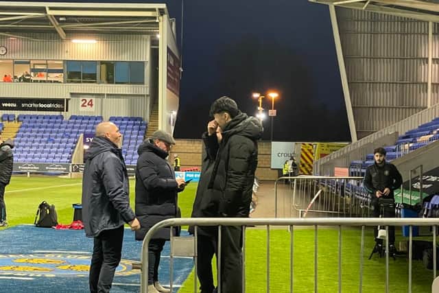 Michael Appleton speaking to Isaac Lee