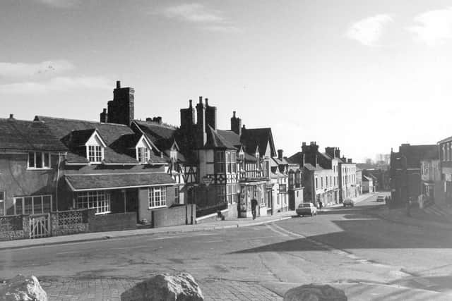 This picture of Broseley High Street was shared by Paul France who said: this is one of three mounted photos rescued from the charity shop. They were taken by a D.H.Rixom and on the back of this one is written 'Street Scape Class, Shot Feb. '82. I think it was probably submitted as a Camera Club competition entry.'
