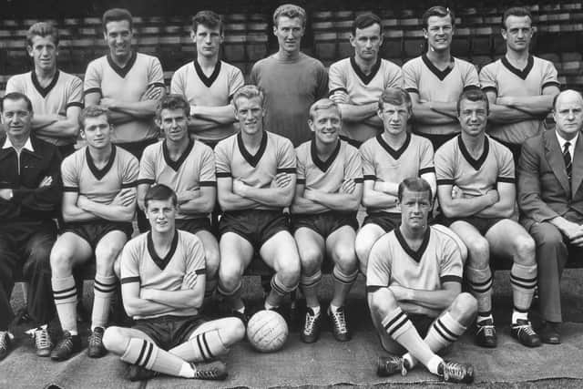 Wolves Collection: August 1963 - Pre season photo call at Molineux for back, from left: Peter Broadbent, Johnny Kirkham, David Woodfield, Fred Davies, Jimmy Murray, Ted Farmer, Gerry Harris. Seated: Joe Gardiner, Terry Wharton, Bobby Thomson, Ron Flowers, Chris Crowe, Alan Hinton, George Showell, Stan Cullis. Front: Fred Goodwin, Barry Stobart. Copyright Express and Star.