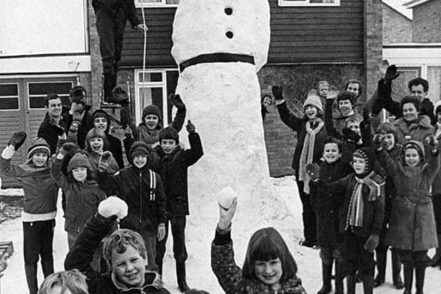January 20, 1979. The caption was: 'This giant snowman was a combined effort by the neighbours of Fair View Drive, Bayston Hill, Shrewsbury. On Saturday, with many helping hands and the use of scaffolding, they achieved a height of 14ft which could get into the Guinness Book of Records.'
