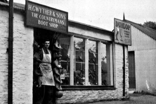 John Gwyther outside the first Gwythers shop in Bishop's Castle in Harley Jenkins Street, behind where the town's Co-op now lies. It opened in 1950.