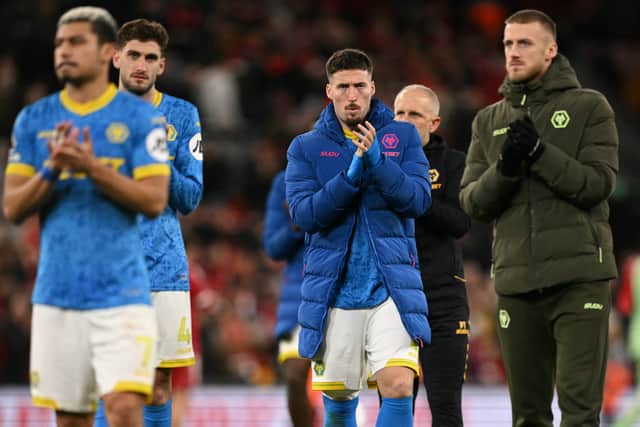 Matt Doherty and team-mates applaud fans (Photo by Oli SCARFF / AFP via Getty Images)