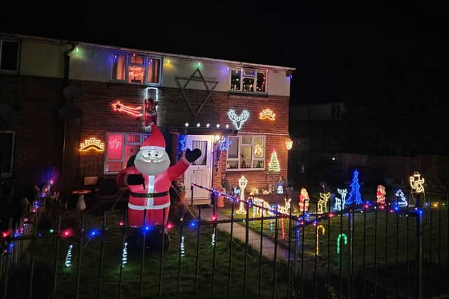 A big inflatable Santa welcomes people to this house in Knighton