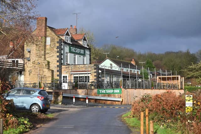 The Ship Inn sits prominently next to the River Severn