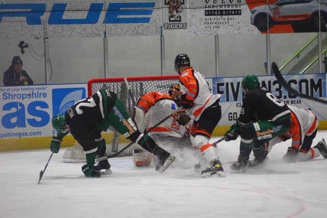 A scramble in front of the Telford Tigers net against Basingstoke Bisons. Pic: Lauren Rankin