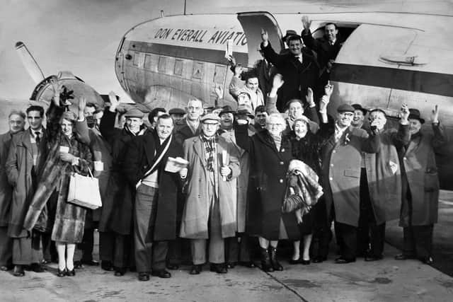 Wolves fans board a Don Everall plane at Elmdon on their way to a cup tie at Newcastle in January 1960.