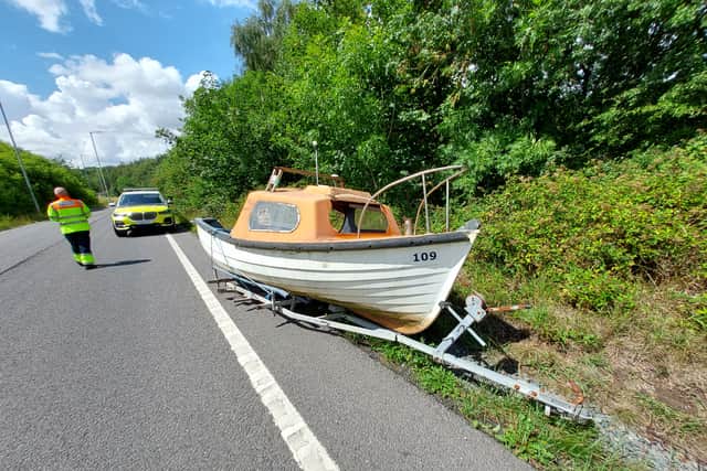 Boat found abandoned at the side of the road