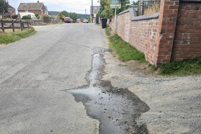 The water company dug up the road in the wrong place despite water seeping through the road
