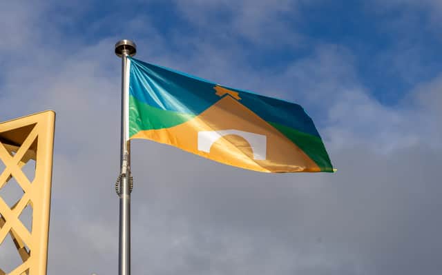 Telford's new flag, designed by nine-year-old Amelia, was raised
