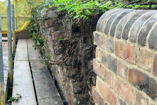 A section of wall by Bridgnorth Cliff Railway remained to be repaired after the initial fix