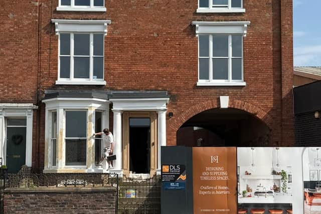 The outside of the property with the finishing touches being put on its renovation earlier this year. Picture: Summer House Interiors
