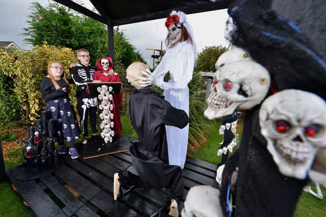 Meadow Road, Craven Arms with (Front) Kerry and Rob Laban who live at the house. Kerry and Robs children: Amber 15 and Leo 13 Laban at the scariest wedding in town.