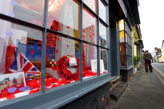 Much Wenlock - the window of Catherine's Bakery in 2018 as the town displayed poppies for Remembrance Day