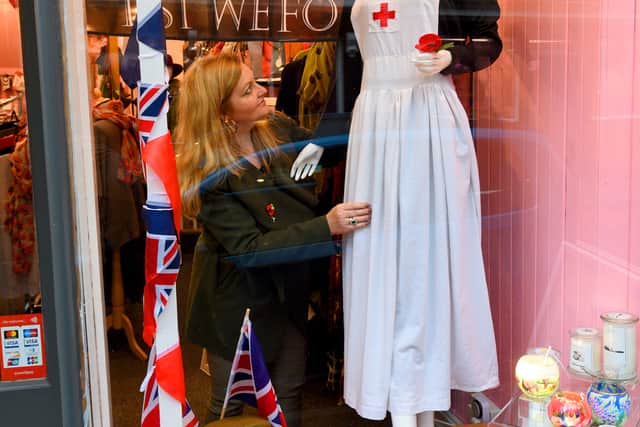 Deborah Bald in the window of La Bella Rosa, Market Drayton, 2018