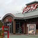 Pizza Hut is to shut 68 restaurants after the company behind its UK restaurants fell into administration (Andrew Matthews/PA)