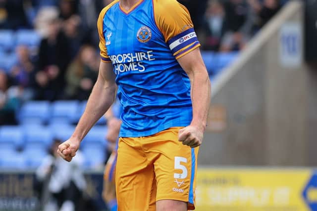 Will Boyle of Shrewsbury Town celebrates after scoring a goal to make it 2-0