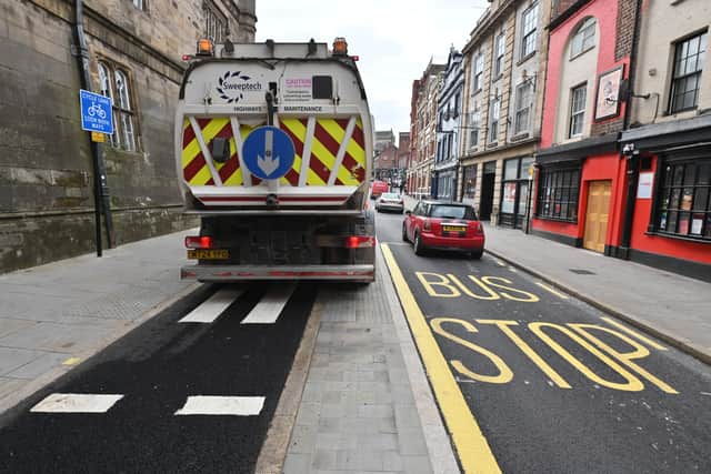 The new bus stop on Castle Gates with the cycle lane to the left.