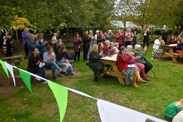 Parents gathering to watch the tree planting at Welshampton C of E School's 175th celebrations. Photo: Steve Leath